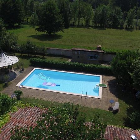 Hôtel Les Deux Magnolias à Saint-Leon-sur-l'Isle Extérieur photo